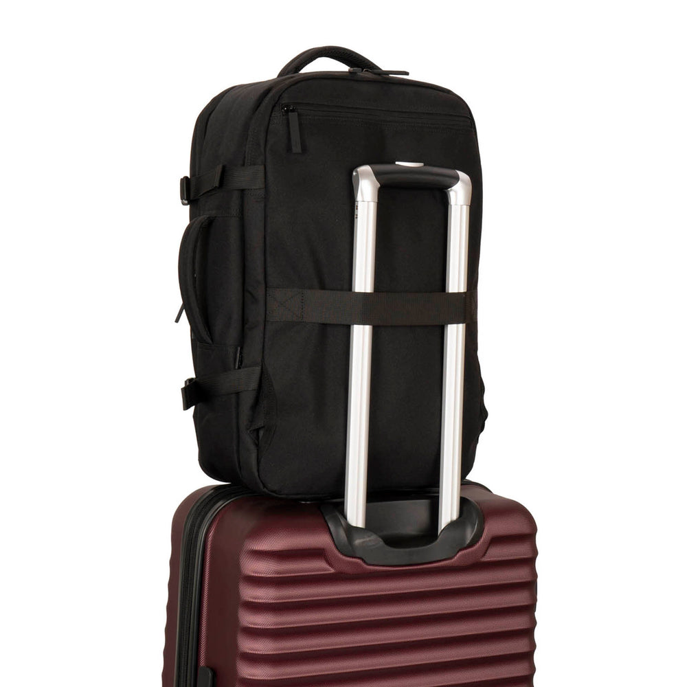 Black backpack called West Bay 3.0 Convertible designed by Tracker showing that it can be mounted on a luggage telescopic handle.