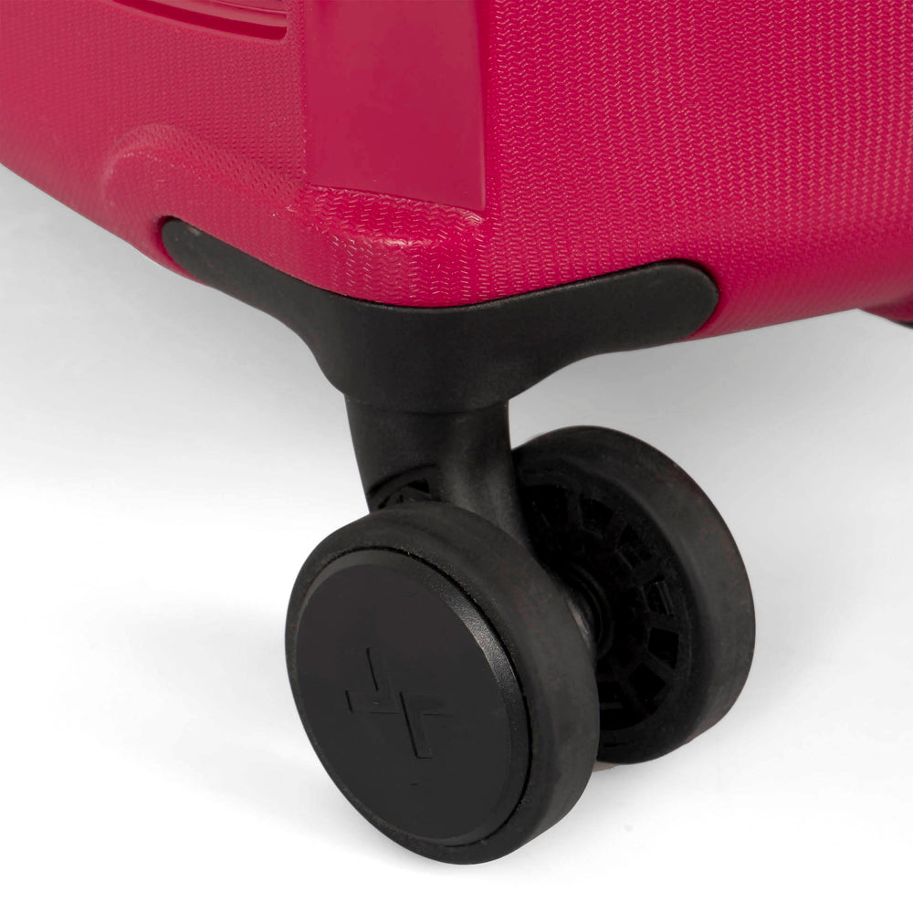 Close up view of a red luggage called Dynamo designed by Tracker showing 1 of 4 spinner wheels with the tracker logo on it.