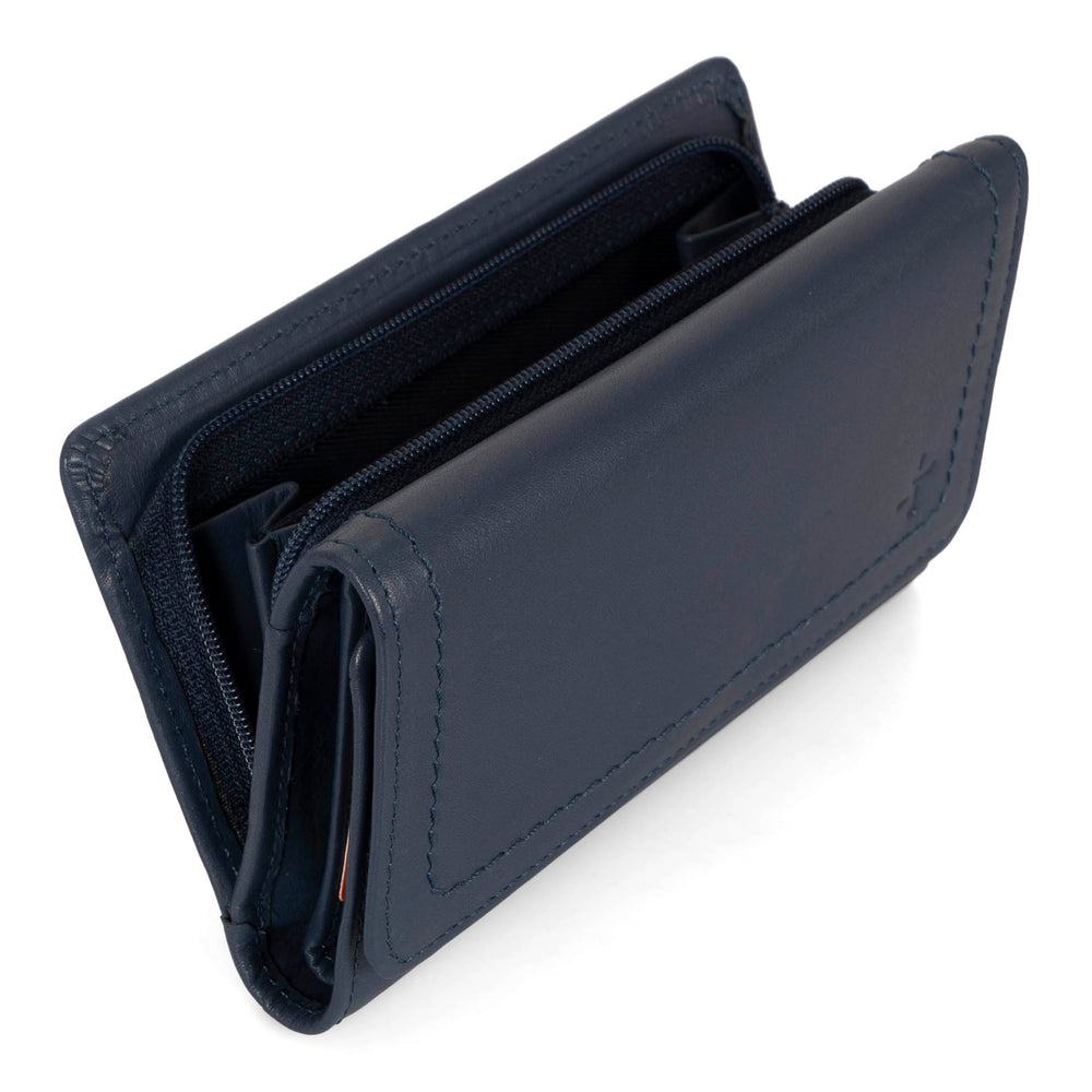 Angle interior view of a navy flap wallet for women called Kara designed by Tracker showing its logo, main compartment, and soft leather.