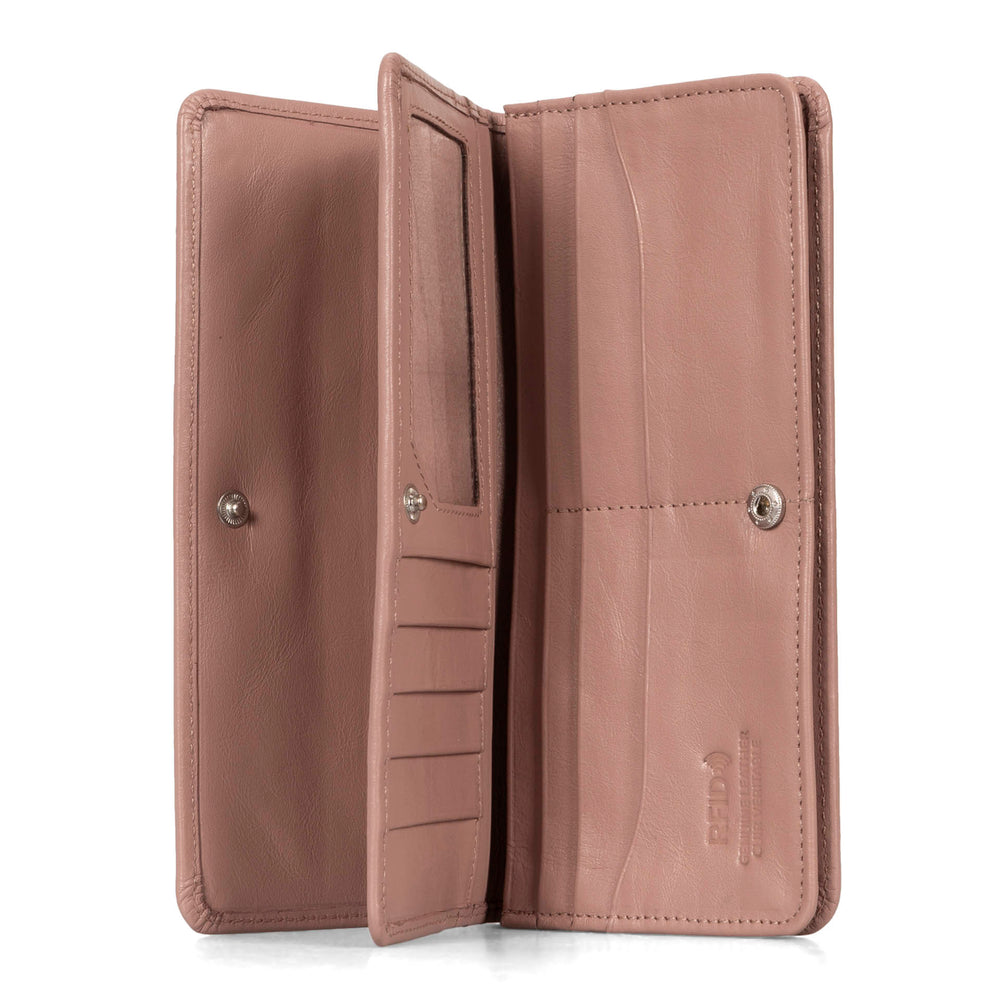 Interior view of a pink women's wallet called Kelly designed by Tracker showing multiple pockets, id window, and snap-button closure.